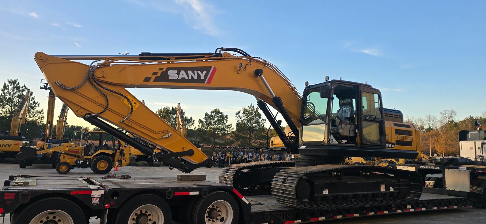 SANY excavator being transported by DETUSH LLC